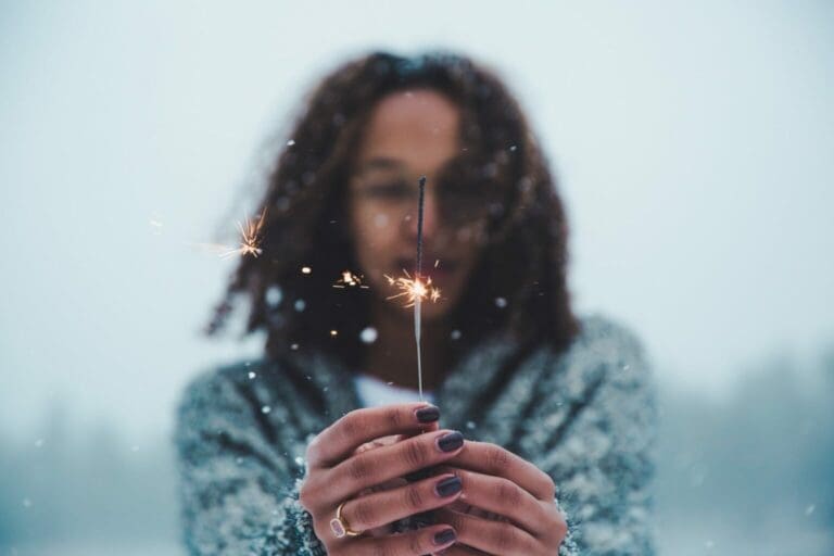woman-w-sparkler-scaled-1-1536x1024-1