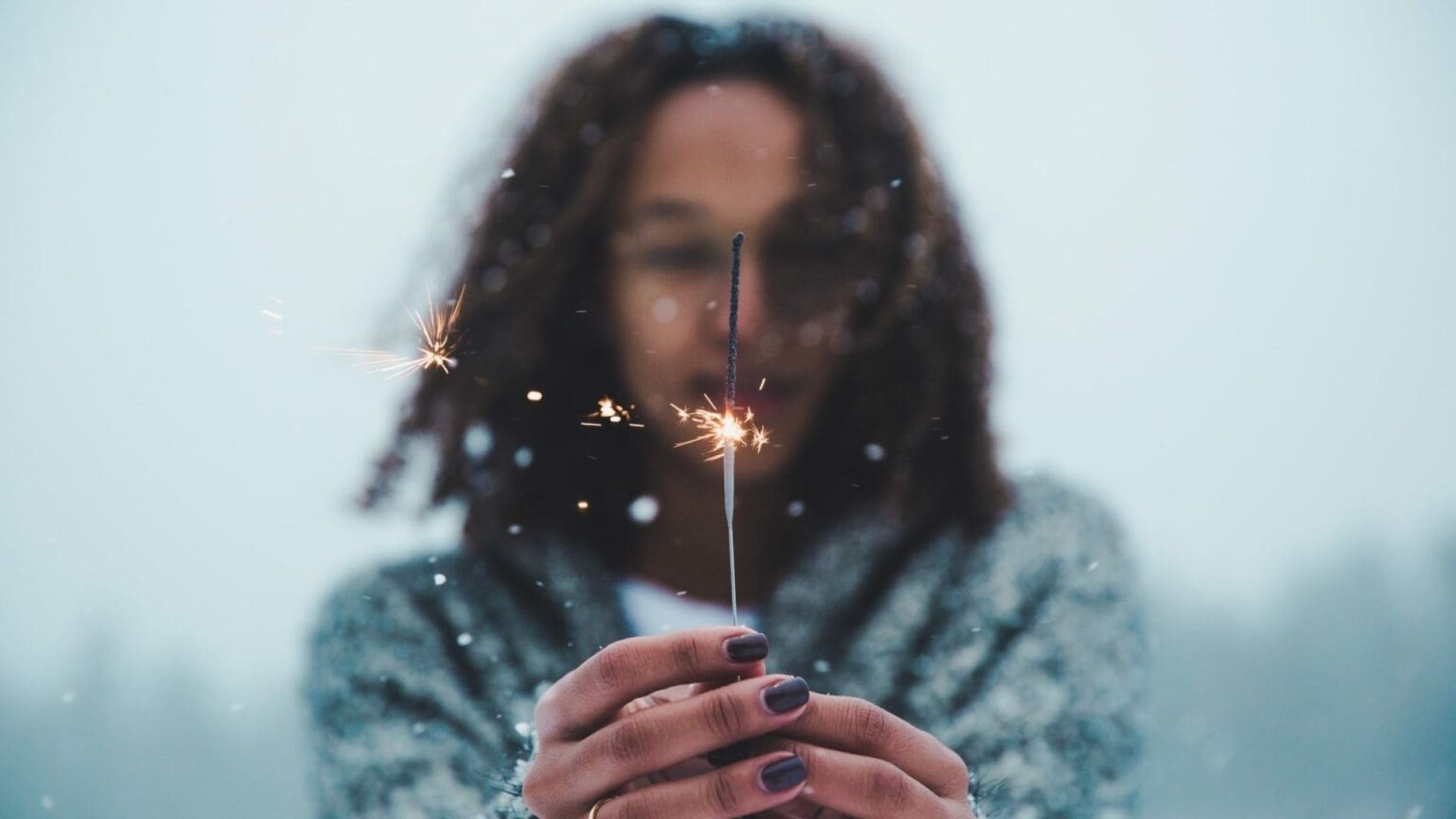 woman-w-sparkler-scaled-1-1536x1024-1